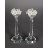 PAIR OF SWAROVSKI CUT CRYSTAL CANDLESTICKS, the sconces each with a garland of frosted glass