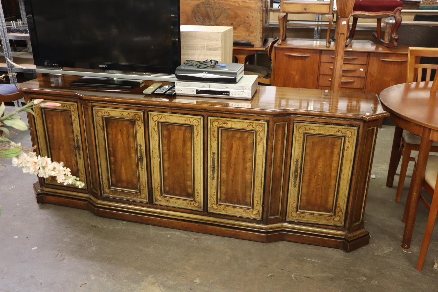 WARING & GILLOW AMERICAN WALNUT SIDEBOARD, WITH ADVANCED BREAKFRONT AND CANTED FORECORNERS, ENCLOSED