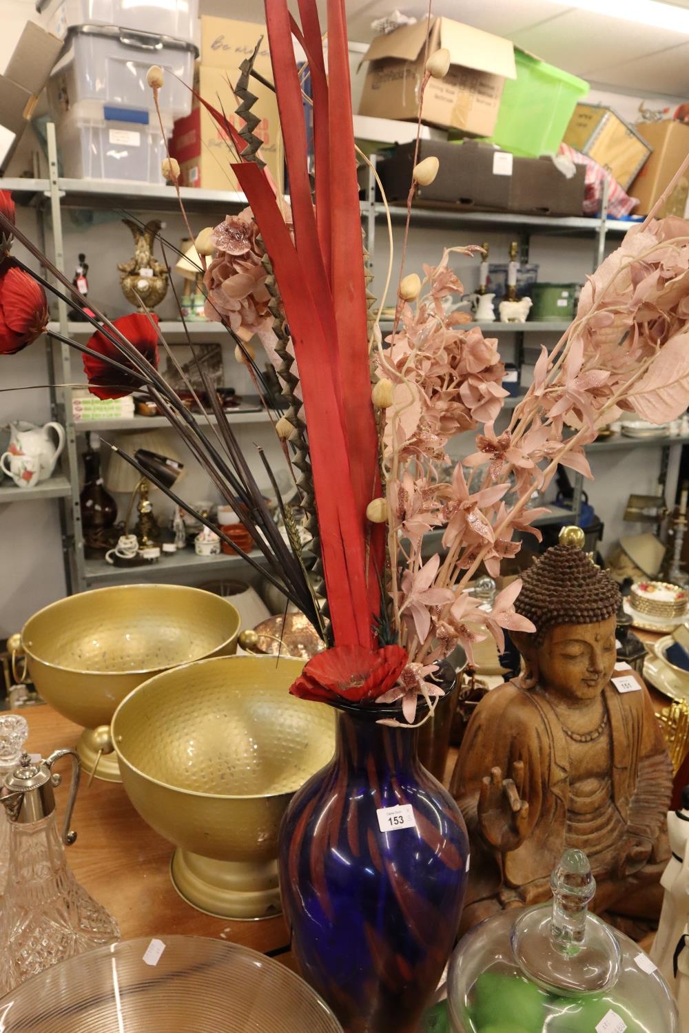 A LARGE GLASS PEDESTAL BOWL AND DOMED COVER WITH TALL FINIAL; A TALL CYLINDRICAL GLASS CANDLE HOLDER