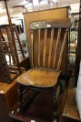 A VICTORIAN ELM SEAT COUNTRY ROCKING CHAIR