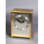 ELLIOTT PRESENTATION GILT METAL MANTLE CLOCK, the silvered dial with Roman chapter ring, powered