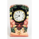 WALTER MOORCROFT SECOND QUALITY OBERON PATTERN TUBE LINED POTTERY MANTLE CLOCK, of milestone form
