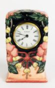 WALTER MOORCROFT SECOND QUALITY OBERON PATTERN TUBE LINED POTTERY MANTLE CLOCK, of milestone form