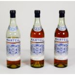 THREE BOTTLES OF MID CENTURY MARTELL THREE STAR ‘VERY OLD PALE COGNAC’, with blue printed labels and