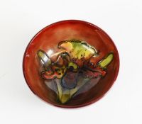 WILLIAM MOORCROFT ORCHID PATTERN TUBE LINED AND FLAMBE GLAZED POTTERY SMALL, FOOTED DISH,