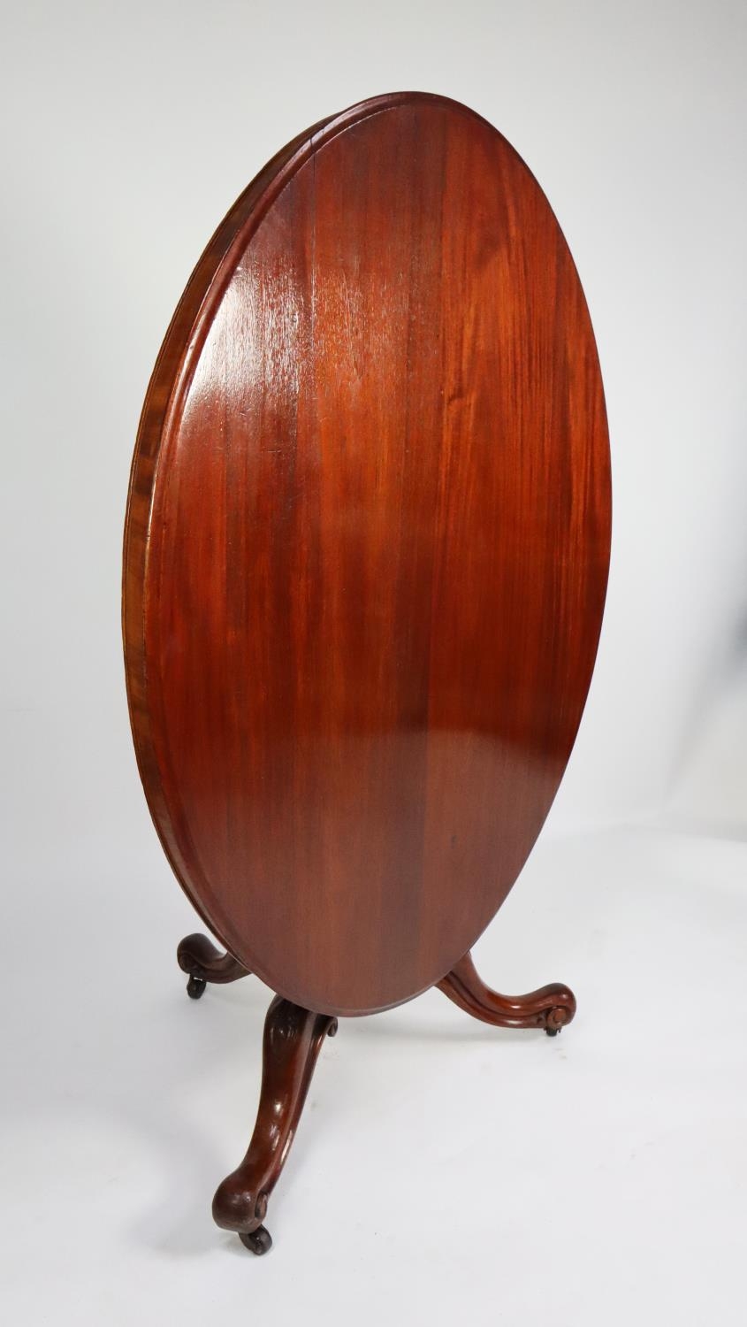 VICTORIAN MAHOGANY LOO TABLE with oval snap-top, on hexagonally panelled tapering column, on - Image 2 of 2