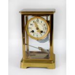 CIRCA 1900 FRENCH BRASS CASED FOUR GLASS MANTEL CLOCK, the movement stamped JAPY FRERES, striking on