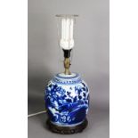 AGED ORIENTAL BLUE AND WHITE PORCELAIN GINGER JAR AND COVER, of typical form with almost flat cover,