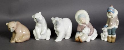 TWO LLADRO PORCELAIN GROUPS OF ESKIMO CHILDREN WITH POLAR BEAR CUBS, together with TWO LLADRO MODELS