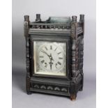 VICTORIAN AESTHETICS MOVEMENT CARVED AND EBONISED WOOD CASED MANTLE CLOCK, the 6 ½” silvered and