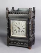 VICTORIAN AESTHETICS MOVEMENT CARVED AND EBONISED WOOD CASED MANTLE CLOCK, the 6 ½” silvered and