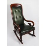 VICTORIAN MAHOGANY ROCKING CHAIR, the moulded show wood frame with arch top, scroll arms and