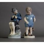 TWO ROYAL COPENHAGEN PORCELAIN FIGURE GROUP, one as a young fisher boy whittling a rod, signed