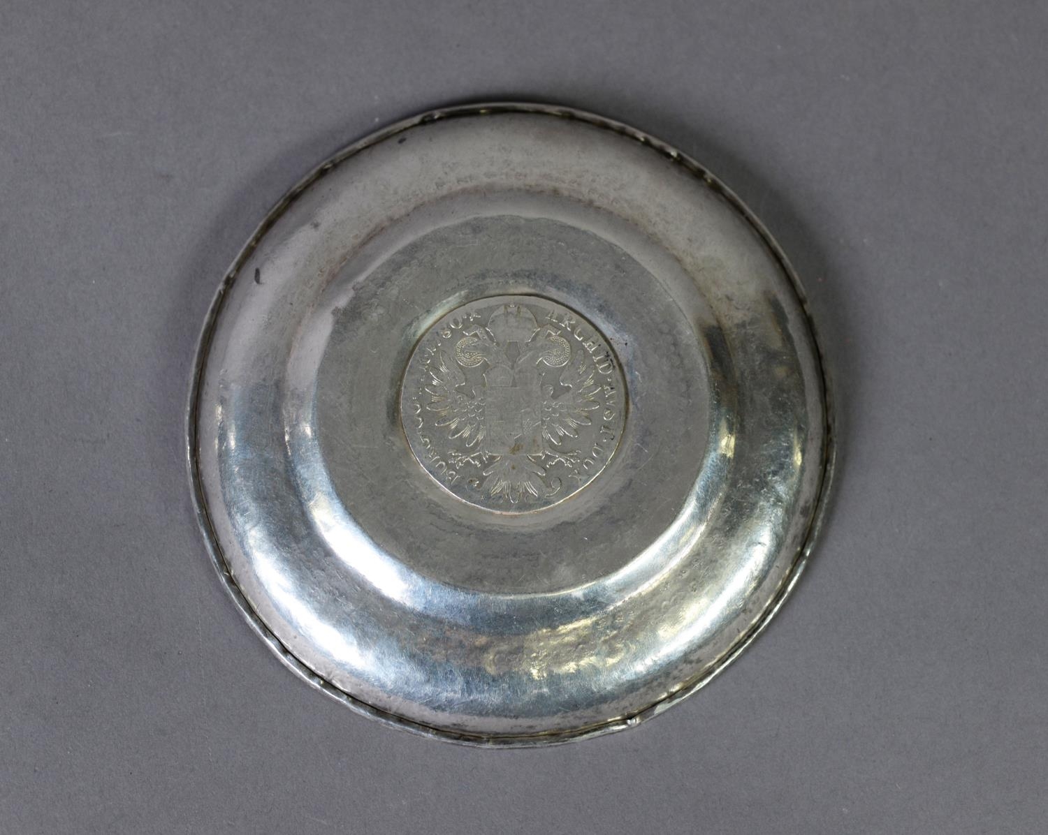 UNMARKED, FOREIGN ENGRAVED SILVER COLOURED METAL DISH SET WITH A MARIE THERESIA SILVER THALER, dated - Image 2 of 2