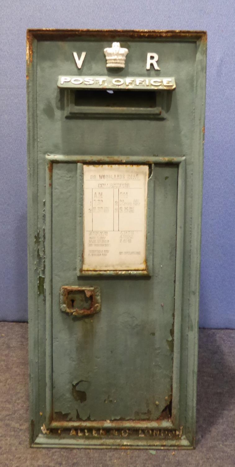 VICTORIAN WALL MOUNTED CAST IRON POSTBOX, CAST IN RELIEF WITH V.R. CENTRED WITH A CROWN AND POST