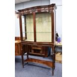 GOOD QUALITY EDWARDIAN SERPENTINE FRONTED, CARVED MAHOGANY DISPLAY CABINET, the dentil moulded