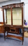 GOOD QUALITY EDWARDIAN SERPENTINE FRONTED, CARVED MAHOGANY DISPLAY CABINET, the dentil moulded