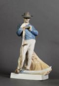 ROYAL COPENHAGEN PORCELAIN FIGURE GROUP OF A FARM HAND WITH SCYTHE, modelled by Christian Thomsen (