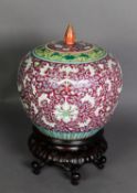 CHINESE QING DYNASTY PORCELAIN SHOULDERED OVOID JAR WITH COVER, the principle border with purplish-