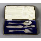 EDWARD VII CASED AND MATCHED THREE PIECE SILVER SERVING SET, with rococo engraved blades, the