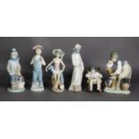 SIX LLADRO PORCELAIN FIGURES, including a little girl asleep in a rocking chair, holding a doll