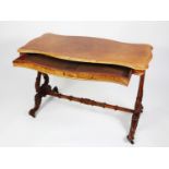 VICTORIAN FIGURED WALNUT SIDE TABLE, or writing table c.1880, with one long, shallow, frieze