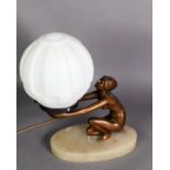 ART DECO PATINATED SPELTER AND ALABASTER FIGURAL TABLE LAMP, modelled as a naked female figure,