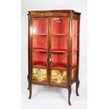 LOUIS XVI STYLE MAHOGANY VITRINE, with glazed concave sides, two glazed doors, the four lower panels
