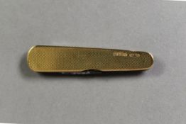 9ct GOLD CLAD PENKNIFE, also with a pair of small scissors, engine turned decoration, 2 1/2in (6.