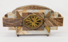 CONTINENTAL ART DECO VEINED MARBLE MANTLE CLOCK, the octagonal, gilt metal, Roman dial powered by