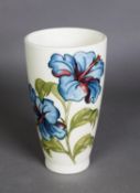 WALTER MOORCROFT ‘HIBISCUS’ PATTERN TUBE LINED POTTERY VASE, of tapering form, 6 ¾” (17.1cm) high,