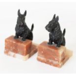 PAIR OF INTER-WAR YEARS JAPANNED SPELTER AND ALABASTER SCOTTIE DOG BOOKENDS, 6 ¼" (16cm) high C/R-