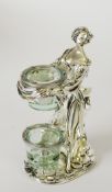 ITALIAN ‘LAMINATO’ CASED SILVER COLOURED METAL FEMALE FIGURAL CANDLE HOLDER, modelled standing