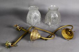 PAIR OF LATE NINETEENTH/ EARLY TWENTIETH CENTURY BRASS ADJUSTABLE WALL LIGHTS, each with swig arm