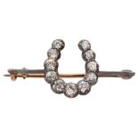 A Victorian diamond-set horseshoe brooch