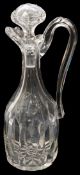 A mid 19th century cut glass claret jug and stopper