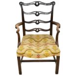 A George III mahogany ladder back armchair