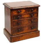 A Victorian mahogany miniature table top chest of drawers