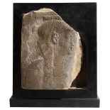 An Egyptian relief carved sandstone fragment