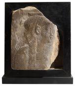 An Egyptian relief carved sandstone fragment