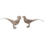An Edwardian novelty silver pheasant pepper pot and another