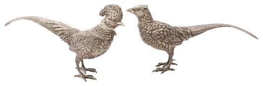 An Edwardian novelty silver pheasant pepper pot and another