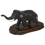 Japanese bronze figure of an elephant on stand