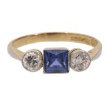 A sapphire and diamond-set three stone ring