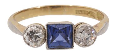 A sapphire and diamond-set three stone ring