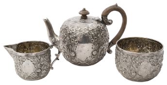 A late Victorian silver three piece bachelors tea service