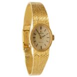 An 18K ladies Omega bracelet wristwatch