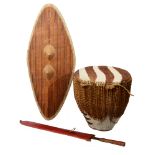 An East African Ganda tribal shield, an East African Maasai sword and a zebra hide drum