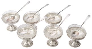 A set of American sterling silver sundae dishes with cut glass liners