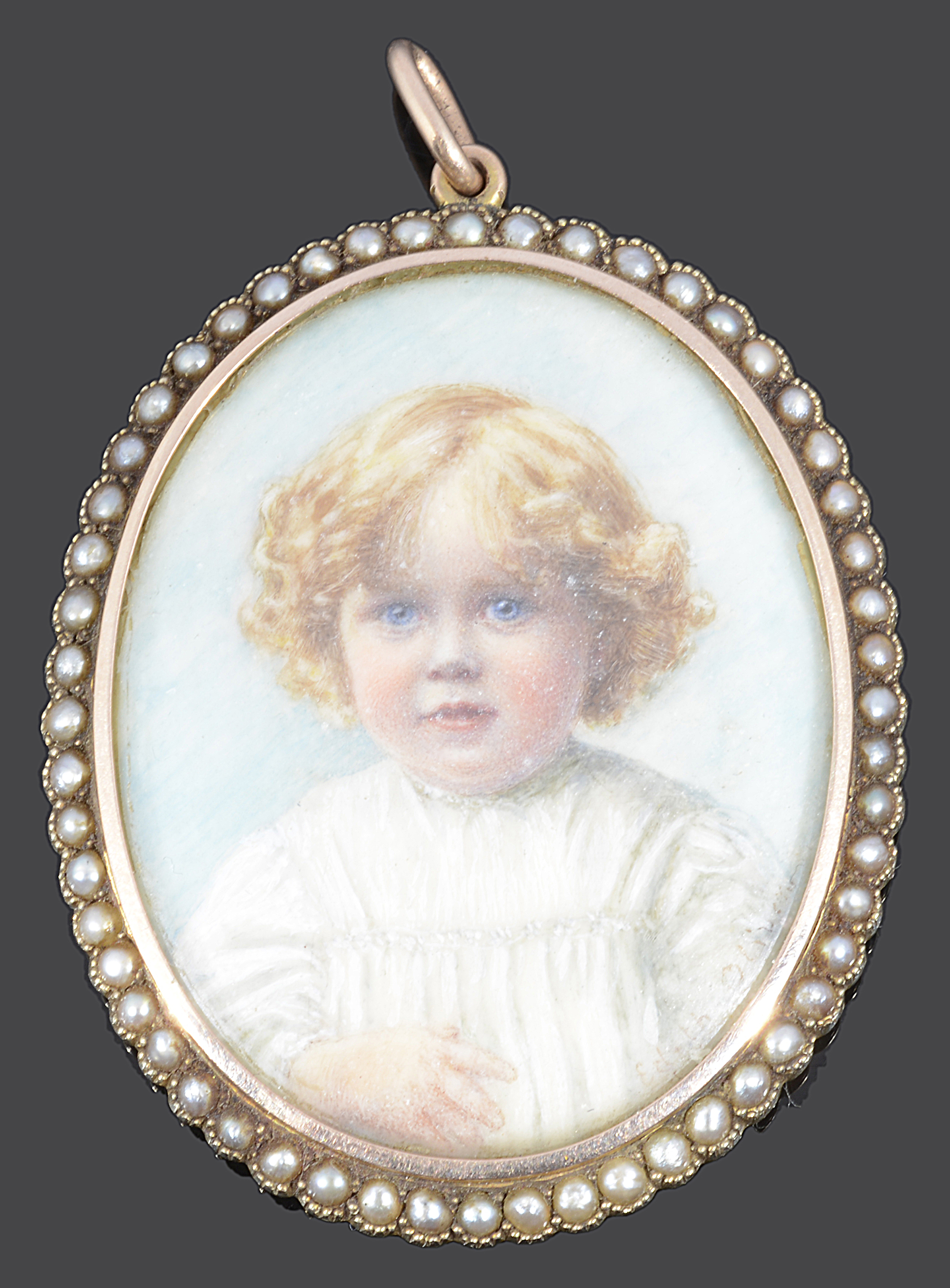 Edith Oliver, Edwardian portrait miniature of a child in gold and pearl set pendant locket